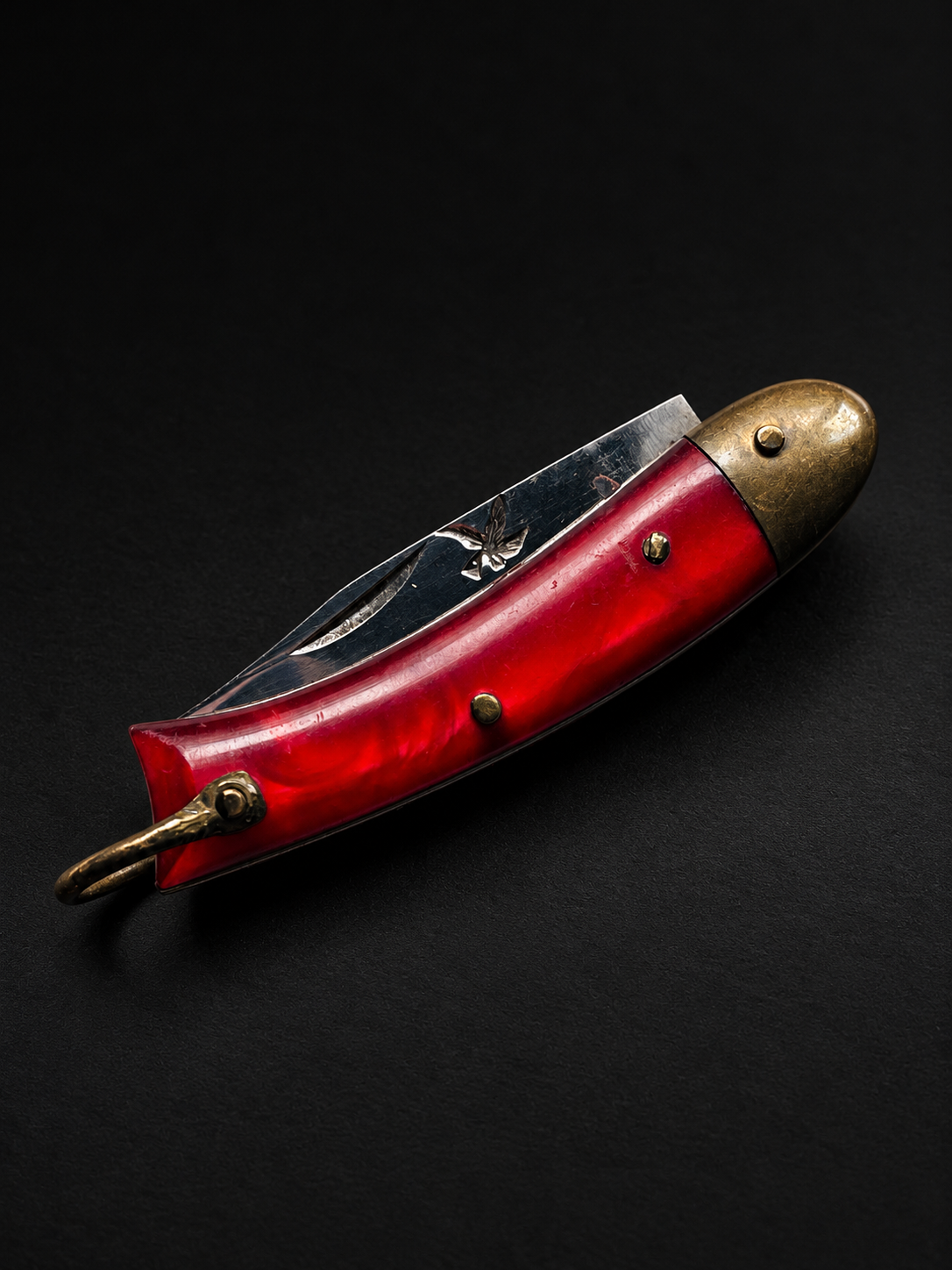 Red Pearloid Fish-Form Folding Knife