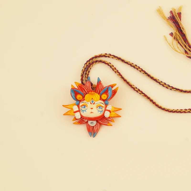 Sun Spirit Pendant - Red Braided Cord – side view showing shape and hand-stitched details
