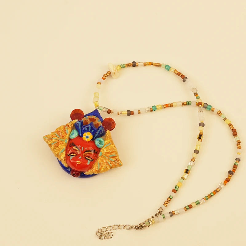 Red Spirit Pendant - Blue Ground – handmade textile gift, main product view