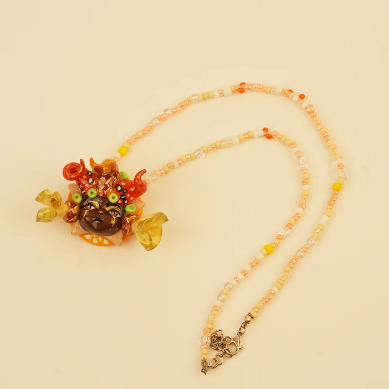 Golden Crown Spirit Pendant - Red Doll Face – handmade textile gift, main product view
