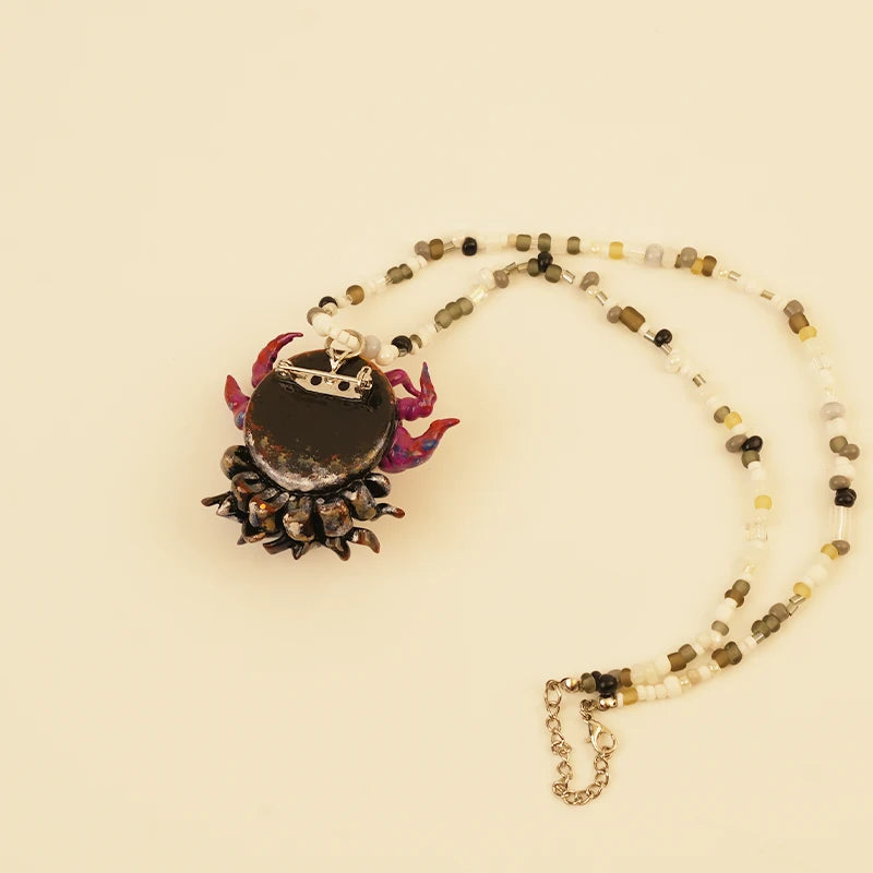 Cosmic Traveler Spirit Pendant - Purple Star Wanderer – side view showing shape and hand-stitched details