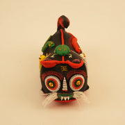Hand-Embroidered Silk Blend Midnight Tiger Guardian Figure – close-up of linen, patchwork, and textile texture