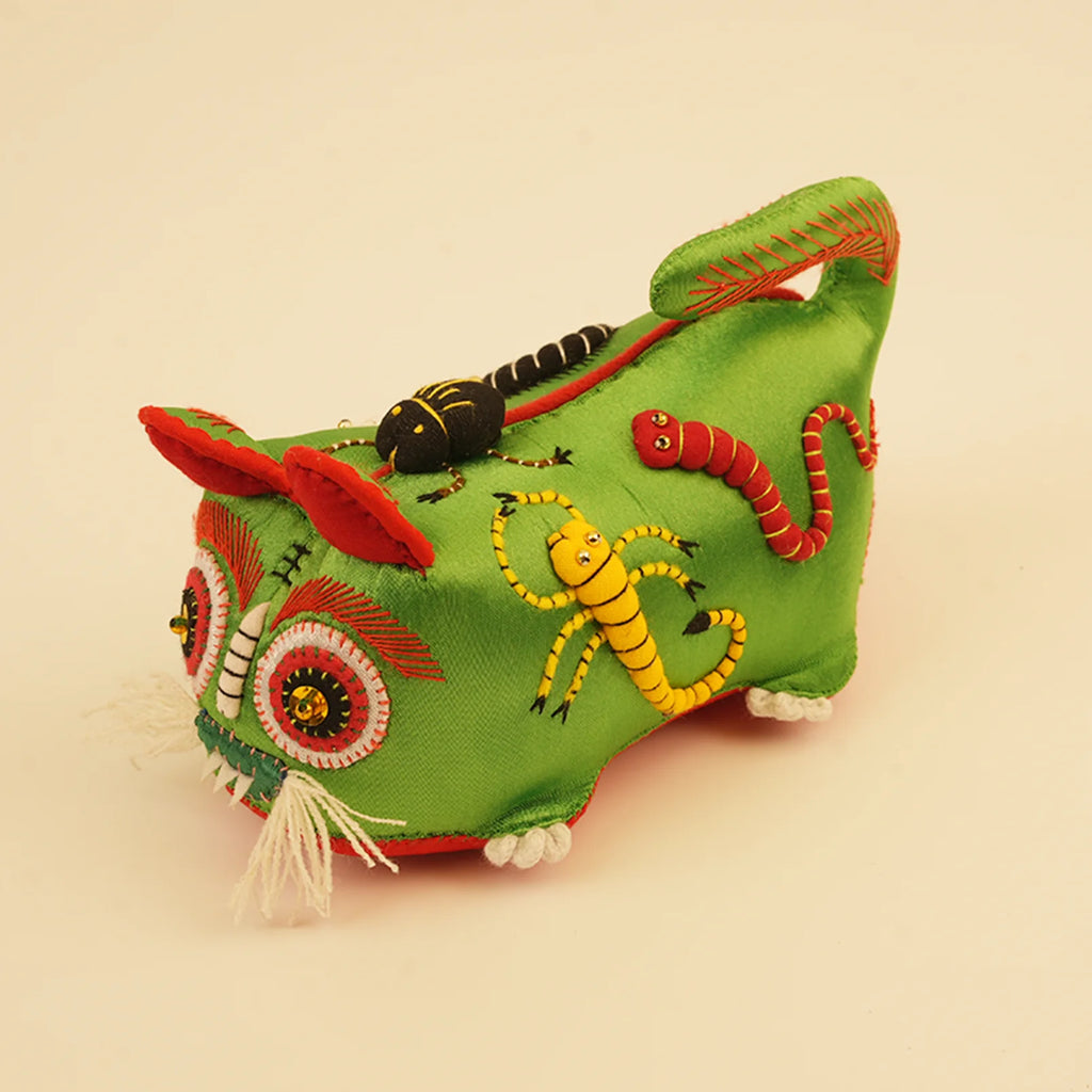 Guardian Tiger spirit doll in jade green colorway, close-up view showing intricate embroidery and nature symbols. Handmade artisan plush toy for protection and balance.