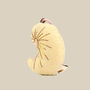 Handcrafted Linen Ivory Nautilus Shell Bag Charm – handmade linen animal bag charm by Brusion