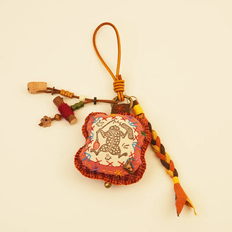 Mythical Fish Bag Charm - Red Fortune – side view showing shape and hand-stitched details