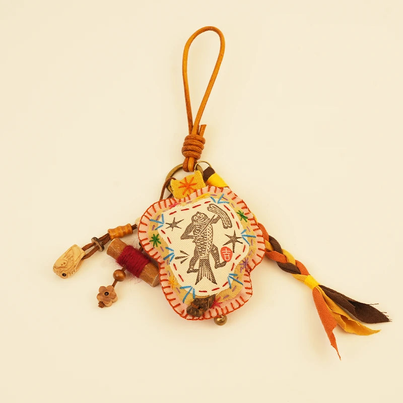 Mythical Fish Charm — Golden Swimmer