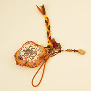 Mythical Monkey Bag Charm - Yellow Wisdom – close-up of linen, patchwork, and textile texture