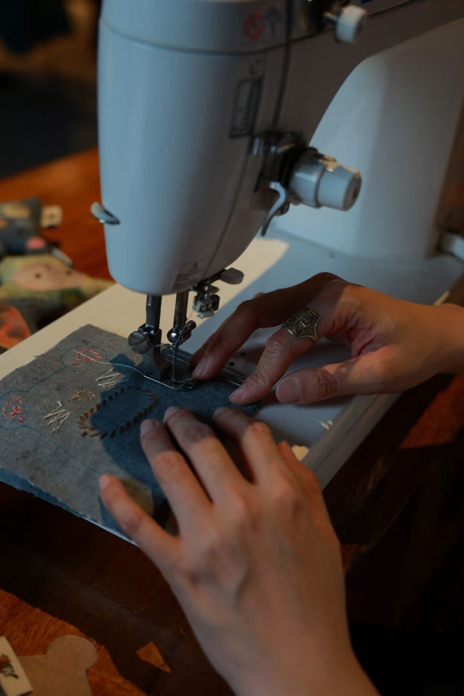 Sewing machine work during the Brusion textile production process