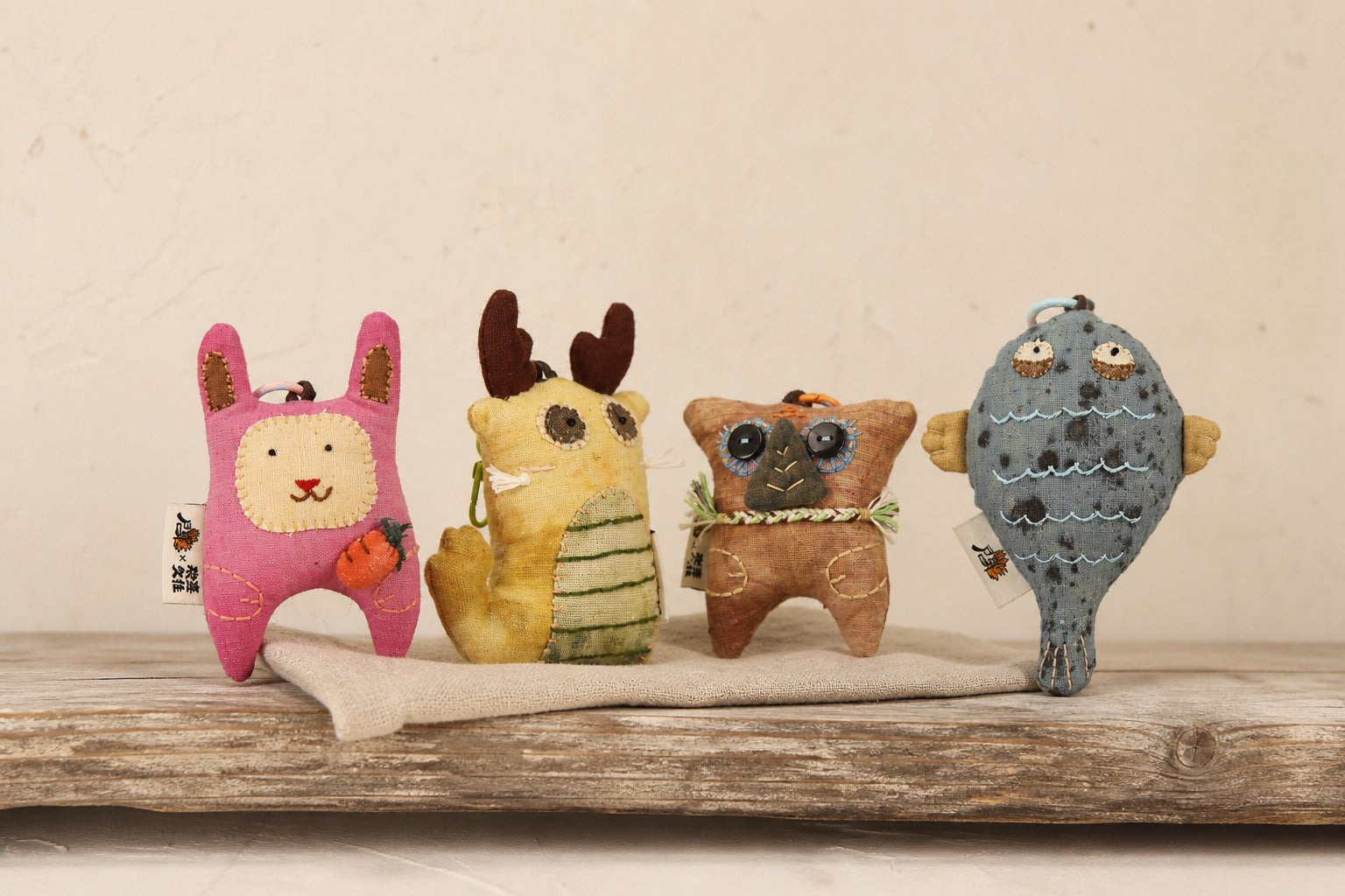 A group of hand-stitched Brusion Eastern zodiac animal companions